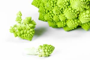 Raw fresh Romanesco broccoli on white background (Flip 2020)