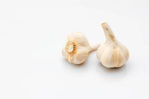 Raw Garlic on a White Background