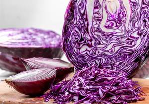 Red cabbage and onions cut close-up