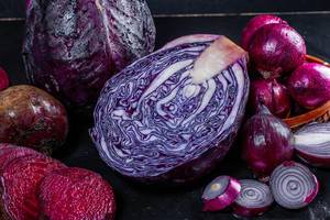 Red cabbage, onions and beets on a dark background (Flip 2019)