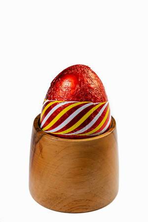 Red Easter Egg in the wooden holder