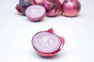 Red Onion close-up on a White Background