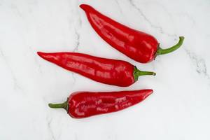 Red Paprika on the white background (Flip 2019)