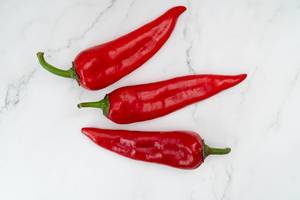 Red Paprika on the white background