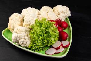 Red Radishes Lettuce and Cauliflower on the plate (Flip 2019)