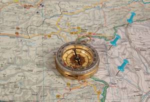 Retro compass on map