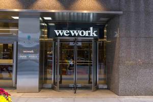 Revolving door entrance of coworking office space "wework" in Chicago