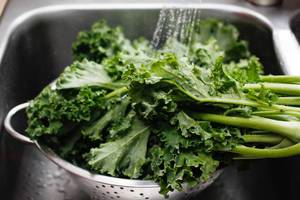 Rinse Kale in a Colander with Water