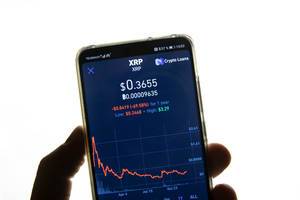 Ripple market value is seen on mobile device