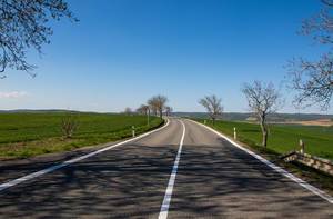 Road through agricultural land in South Moravia