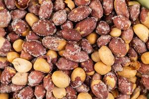 Roasted salted peanuts closeup background (Flip 2019)