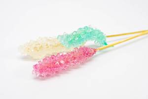 Rock candy on a white surface