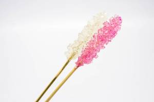 Rock candy on wooden sticks