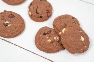 Round Chocolate Cookies on the wooden table