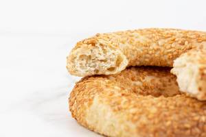 Round Pastry with sesame above white background