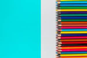 row of colored pencils on a white background (Flip 2019)