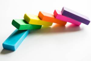 Row of rainbow color erasers