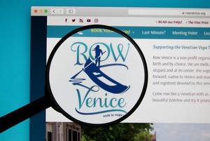 Row Venice logo on a computer screen with a magnifying glass