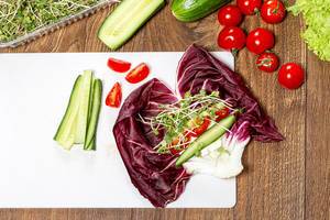 Salad chicory radicchio with cheese, vegetables and radish micro greens (Flip 2019)