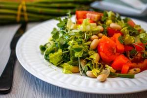 Salad With White Bean, tomato, asparagus and cucumber Close-Up