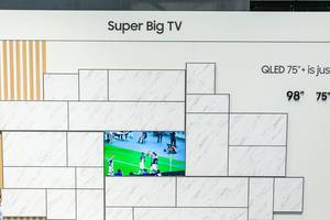 Samsung Television: Soccer game on a Super Big TV QLED in a white wall
