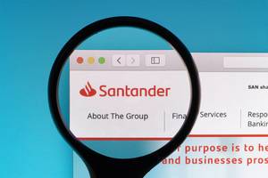 Santander logo under magnifying glass