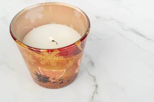 Scented Candle on the white marble table (Flip 2019)