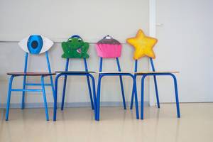 School chairs decorated by children