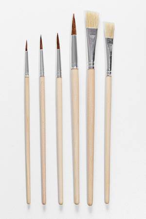 Set paint brushes on white background