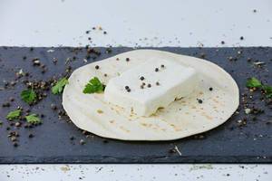 Sheep cheese and Lebanese pita with peppercorn and parsley