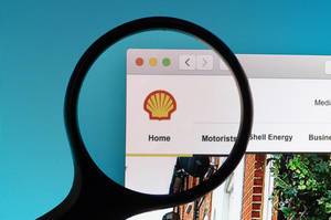Shell logo under magnifying glass