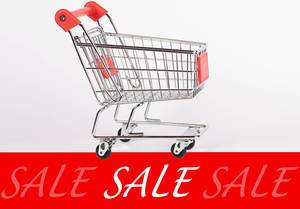 Shopping cart with sale sign