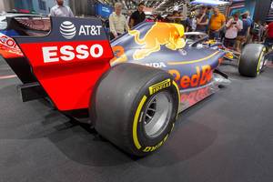 Side view of Formula One racing car for the 2019 World Championship: Aston Martin Red Bull Racing RB15, with Honda RA619H motor