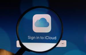 Sign in to iCloud under magnifying glass