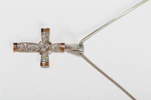 Silver cross on white background