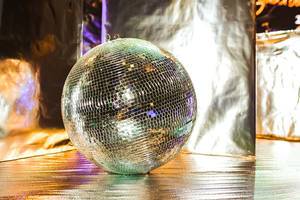 Silver Glitter Disco Ball On The Stage