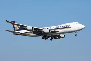 Singapore Airlines Cargo up in the blue sky, Boeing B747