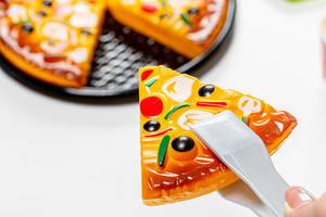 Slice of toy pizza closeup (Flip 2019)