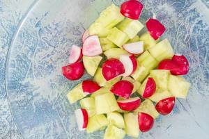 Sliced Cucumber with Red Radishes salad
