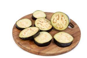 Sliced Eggplant on the roung wooden board