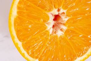 Sliced Half Orange fruit macro closeup image