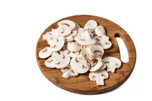Sliced Mushrooms on the wooden board