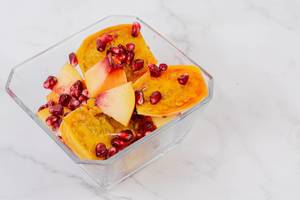 Sliced Peach with Pomegranate in the bowl (Flip 2019)