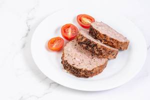 Sliced Pork and Chicken Meat Loaf with Cumin and Tomatoes