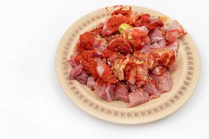 Sliced-raw-Meat-with-Paprika-Spices-ready-for-frying.jpg
