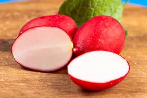 Sliced Red Radishes on the wooden board