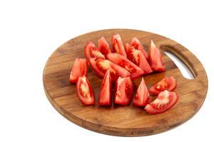 Sliced Tomato on the wooden board (Flip 2019)