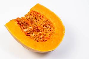 Sliced Yellow Pumpkin on the white background
