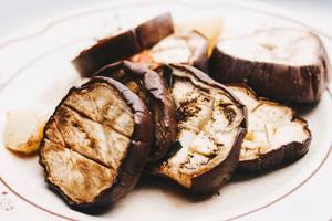Slices of eggplant roasted in a grill