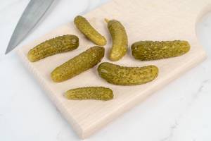 Small Pickles on the wooden board